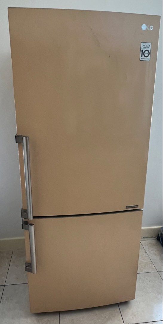 LG Inverter Linear Compressor Bottom Freezer Refrigerator (Category: Refrigerators and Freezers) located in Manila. Submitted by noblecrystal_ff870c (Listing ID 1467265130, Image 2). Description: - Brand/Model: LG Bottom Freezer Refrigerator - Technology: Inverter Linear Compressor & Multi Air Flow system - Exterior: Beige finish with dark grey side panels and sturdy metal handles - Interior Features: Adjustable glass shelves, pull-out tray, bott
