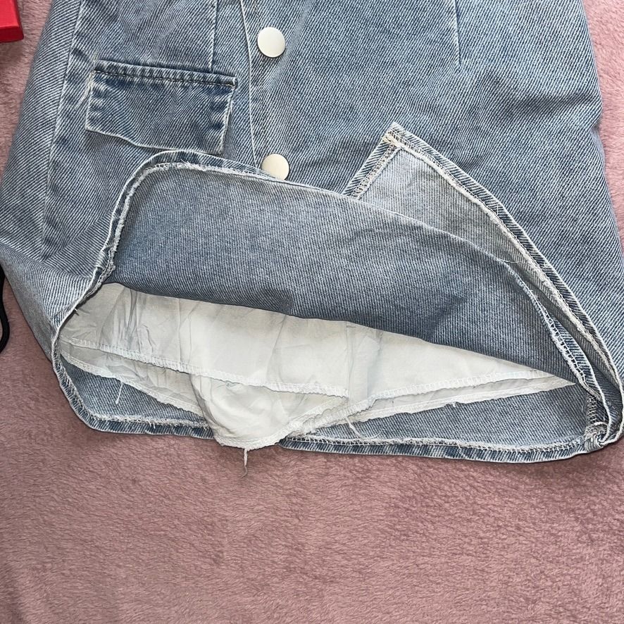 Light Asymmetrical Overlap A-Line Denim Skort (Category: Skirts) located in Angeles City. Submitted by ownit_ac (Listing ID 1467180363, Image 3). Description: Already laundered, ready to wear 3 buttons in front (all are designs) Front pocket is a design With inner shorts Back zipper High waist S on tag Brand: Qin Qin Waist: 25-26 in. Length: 17-18 in. Color may vary due to lighting.