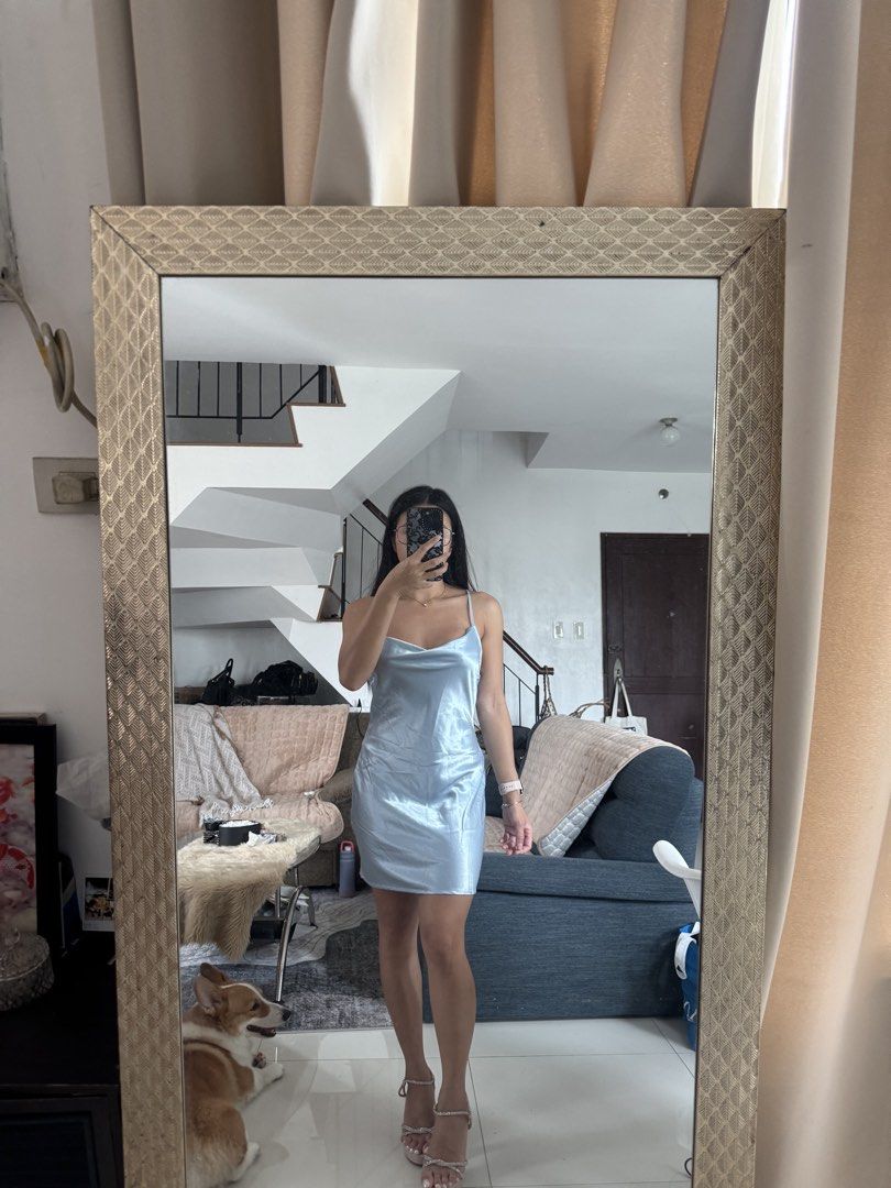 Light Blue Satin Mini Dress Open Back (Category: Dresses) located in Quezon City. Submitted by edescootauco (Listing ID 1467264797, Image 1). Description: Light blue satin mini dress. Cowl neckline with thin halter straps. Open back design with cross-straps. Smooth, shiny fabric. Worn once for a few hours, super clean condition. Fits true to size, great for parties or night outs. Fits small to medium.