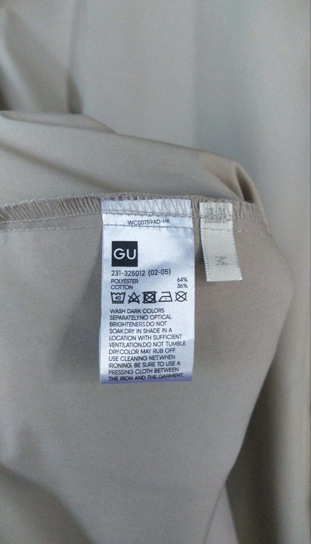 Light Grey Button-Up Shirt Dress with Pockets (Category: Dresses) located in Goa. Submitted by quicktree_baby (Listing ID 1467244249, Image 3). Description: - Color: Light grey - Style: Knee-length shirt dress with mandarin collar and short cuffed sleeves - Closure: Full button placket down the front - Features: Practical side pockets - Fabric: Smooth and comfortable - Perfect for: Everyday wear or casual work outfits.