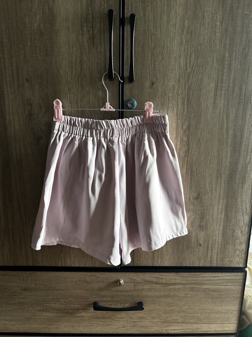 Light Pink Split Hem Skort with Elastic Waistband (Category: Skirts) located in Makati City. Submitted by magwayr19 (Listing ID 1467231443, Image 2). Description: - Color: Cute light pink / Pastel - Fit: Super stretchy elastic waistband for easy pull-on comfort - Versatility: Great basic piece that easily matches lots of casual tops - No brand.
