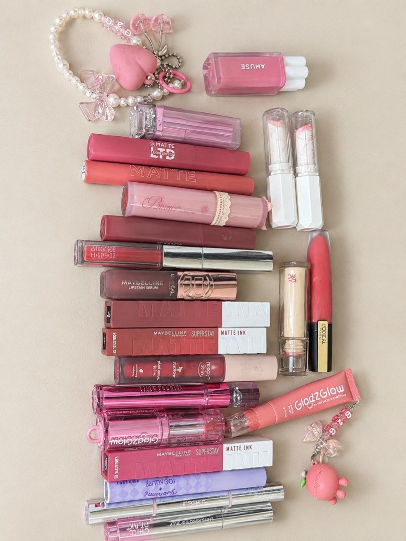 LIPSTICK BUNDLE (Category: Makeup) located in Makati City. Submitted by FashionFactory (Listing ID 1467349201, Image 1). Description: - Massive lip product bundle from top brands like Maybelline, L'Oreal, Happy Skin, and Bisous - Variety of shades including pinks, nudes, and berries - Mix of formulas: matte liquids, glossy tints, and hydrating balms - Bonus: Includes a cute charm bracelet - Great way to test multiple brands and formulas in one go