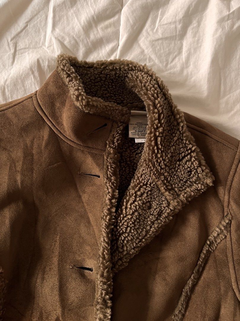 L.L. Bean Brown Suede Shearling Winter Coat (Category: Coats, Jackets and Outerwear) located in Manila. Submitted by miyu.ga (Listing ID 1467190748, Image 3). Description: - Brand: L.L. Bean - Material: Brown faux suede with cozy sherpa lining - Closure: Button-front - Pockets: Deep front pockets - Details: Fluffy fleece trim on collar and cuffs, structured paneled stitching - Origin: Made in Thailand - Condition/Style: Warm winter layer in a gre