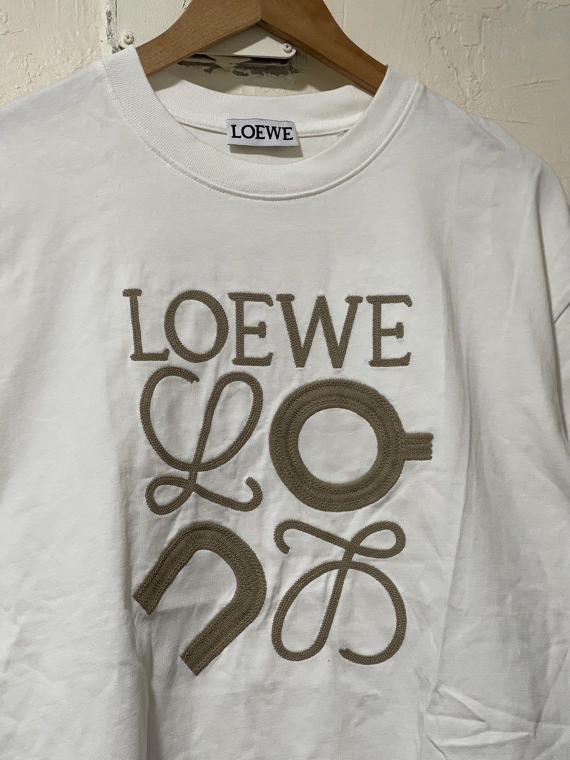 Loewe x On Technical Shirt size Large (Category: Luxury Apparel) located in Marikina City. Submitted by joshuaades21107 (Listing ID 1467267798, Image 2). Description: Loewe x On Technical Embroidered Design Size Large on tag 22 width 28 length .