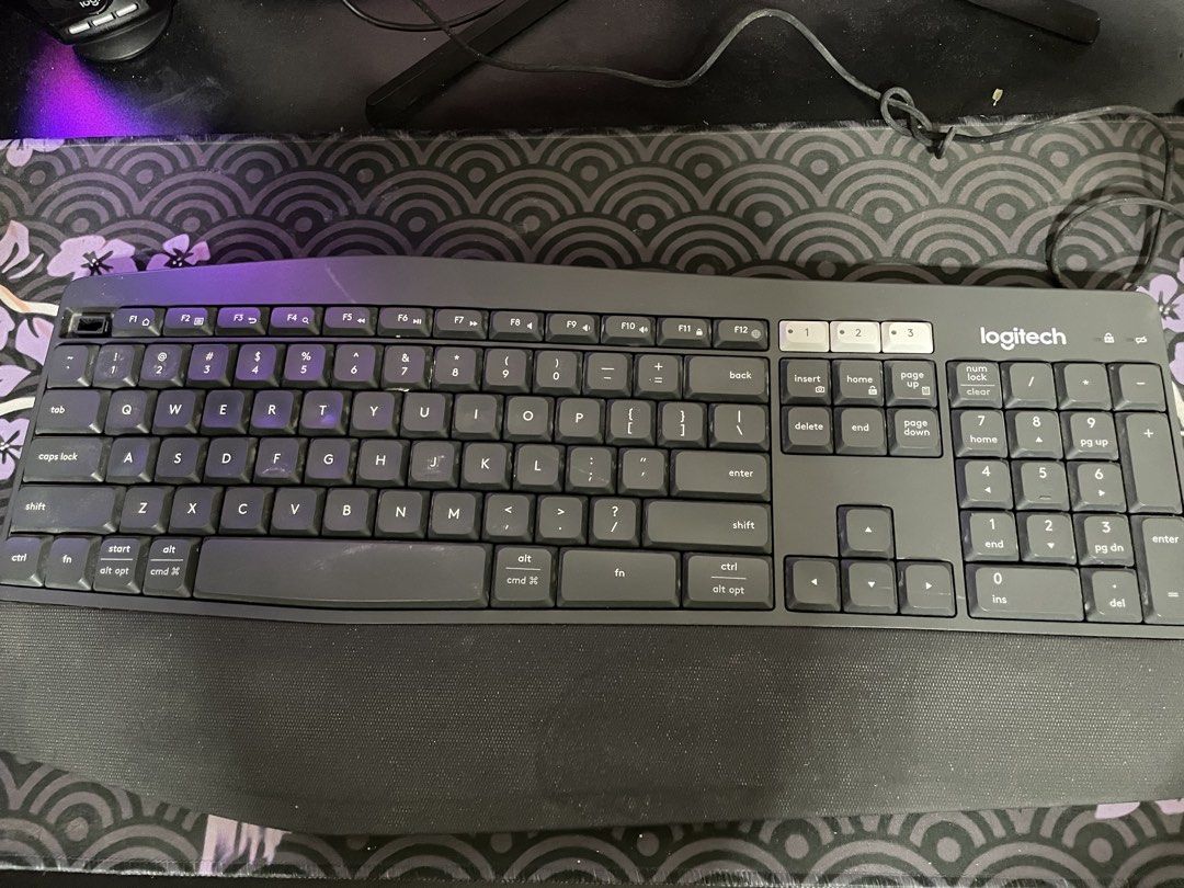 Logitech K850 Wireless Keyboard (Category: Computer Keyboard) located in General Trias. Submitted by ashi_kt0 (Listing ID 1467211021, Image 2). Description: - Model: Logitech K850 Wireless Keyboard (Dark Grey) - Layout: Full-size with integrated cushioned palm rest and number pad - Connectivity: Multi-device pairing (Easy-switch buttons 1, 2, 3) via Bluetooth or USB receiver - Condition: Clean and 100% working smoothly - Best For: Office work and
