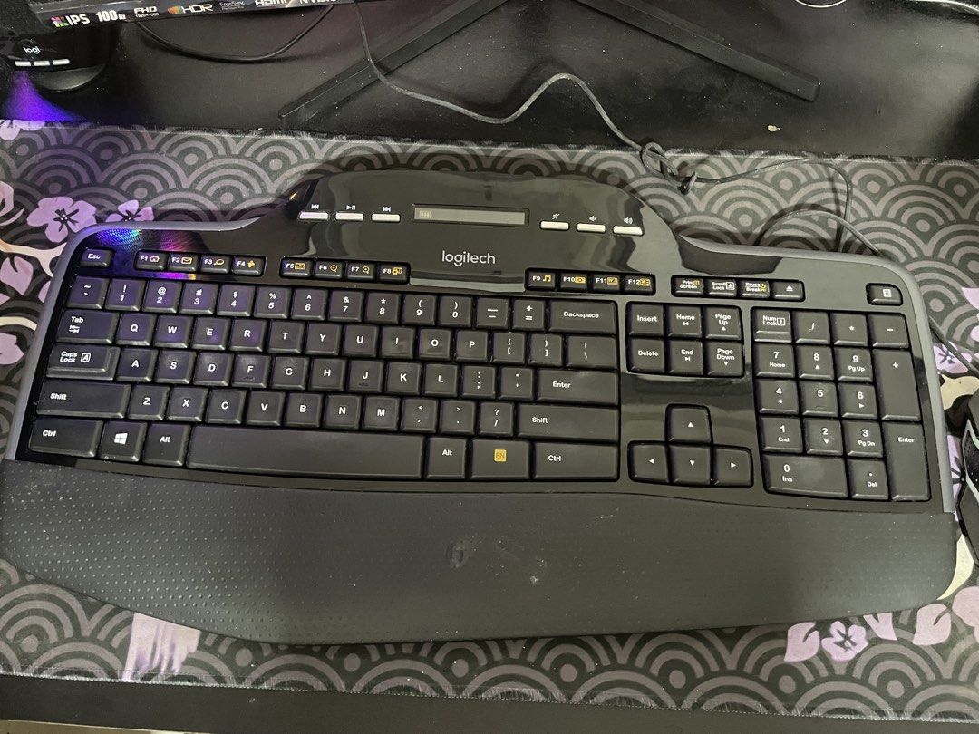 Logitech MK710 Wireless Keyboard (Category: Computer Keyboard) located in General Trias. Submitted by ashi_kt0 (Listing ID 1467210537, Image 2). Description: - Model: Logitech MK710 Wireless Keyboard (Model Y-R0059) - Layout: Standard QWERTY with curved wave design and full numeric keypad - Comfort: Built-in integrated palm rest for all-day typing - Display: Handy LCD status dashboard for battery and connection info - Controls: Dedicated media co