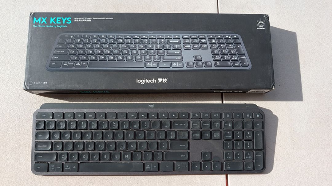Logitech MX Keys Advanced Wireless Illuminated Keyboard (Graphite) (Category: Computer Keyboard) located in Bacoor. Submitted by rdeveyra (Listing ID 1467253083, Image 1). Description: Logitech MX Keys in Graphite color for sale. Item is used, still works well but with occasional misfires. Riser feet added for a better typing angle. PM me for faster transactions and/or inquiries..