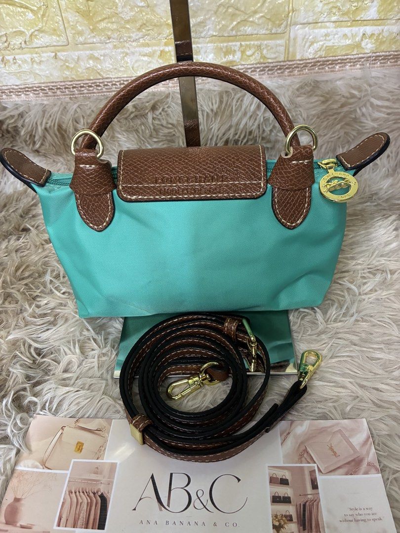 Long Champ Pouch Bag w/Strap Torquoise (Category: Cross-body Bags) located in Subic. Submitted by anabananaco. (Listing ID 1467348889, Image 2). Description: Guaranteed authentic 👌 preloved bag 👜 from Japan 🇯🇵 .