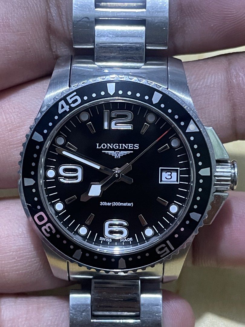 Longines HydroConquest (Category: Men's Watches) located in Taguig. Submitted by tester1x (Listing ID 1467280733, Image 3). Description: Longines HydroConquest Swiss Made L3. 340. 4 45455387 Black Dial Sapphire Crystal All Stainless Steel Case & Bracelet 34mm 7inch wrist size .
