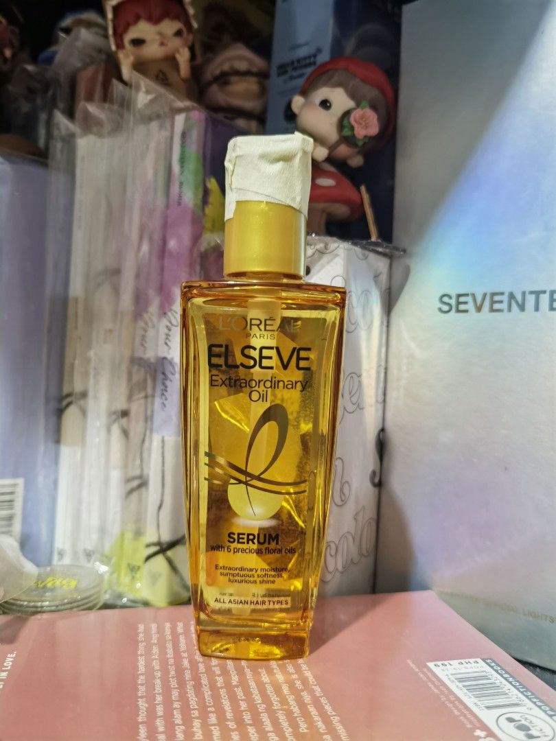 L'Oreal Paris Elseve Extraordinary Oil Serum (Category: Hair) located in General Trias. Submitted by shay_1407 (Listing ID 1467334382, Image 1). Description: - Product: L'Oreal Paris Elseve Extraordinary Oil Serum (Gold Bottle) - Size: Full size (Note: cap is secured with tape) - Formula: Infused with 6 precious floral oils - Hair Type: Specially formulated for all Asian hair types - Benefits: Delivers extraordinary moisture, intense softness, an