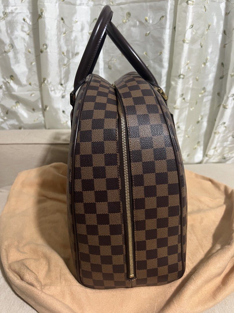 Louis Vuitton Nolita (Category: Luxury Bags & Wallets) located in Antipolo. Submitted by cyloveak1328 (Listing ID 1467232526, Image 2). Description: Rank A Condition Louis Vuitton Nolita Hand Bag in Damier Ebene Canvas and Gold Hardware.