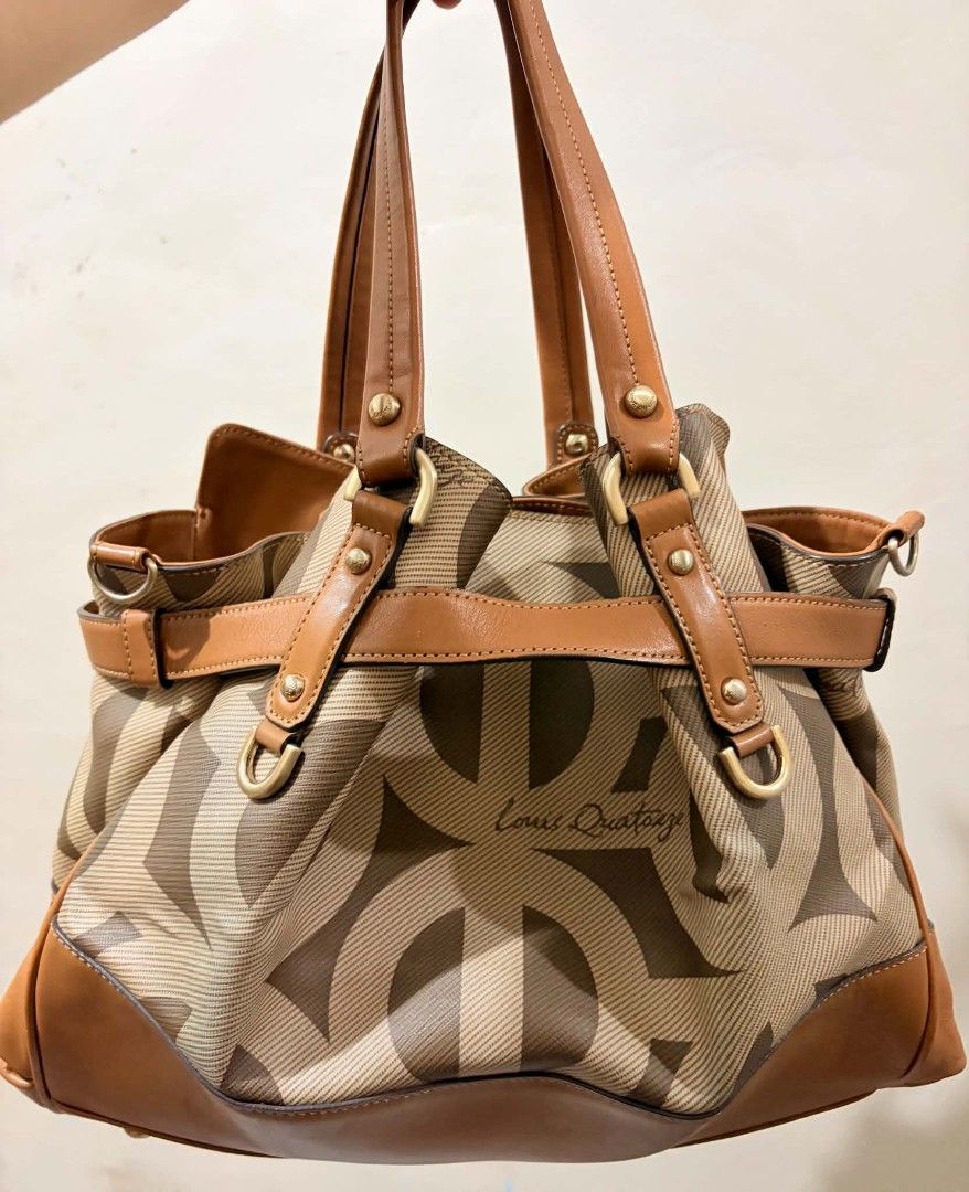 Louis Quatorze Monogram Tote Bag with Strap (Category: Luxury Bags & Wallets) located in Manila. Submitted by serenitycarlylle (Listing ID 1467349880, Image 2). Description: Official Louis Quatorze Monogram Canvas & Tan Leather Satchel Tote Elevate your everyday look with this elegant, high-end tote! ✨ Authentic Louis Quatorze 2-way satchel featuring the signature monogram jacquard print with rich tan genuine leather trim and gold-tone hardware. 