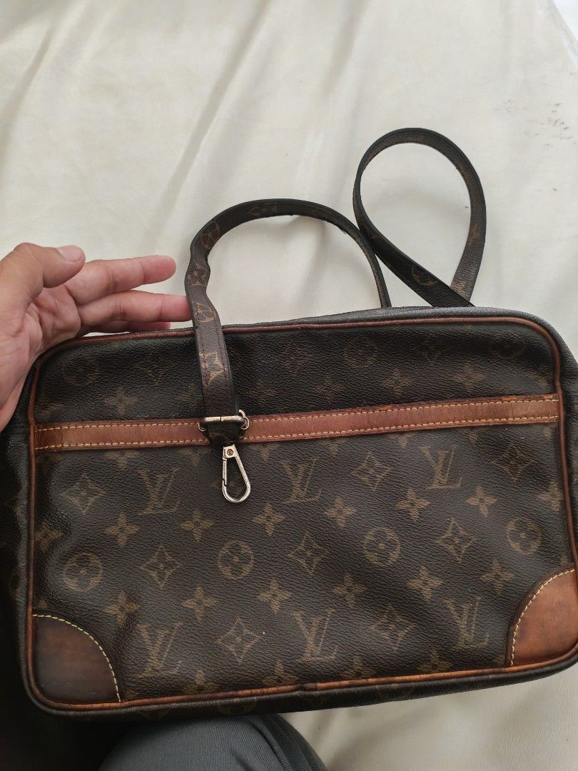 Louis Vuitton Monogram Canvas Shoulder Bag (Category: Luxury Bags & Wallets) located in Dipolog. Submitted by jamesestrada00 (Listing ID 1467224707, Image 2). Description: Classic Monogram canvas shoulder bag from Louis Vuitton. Made in France. Brown canvas body with tan leather trim, gold-tone hardware, and adjustable strap. Zip closure across the top with an inside zippered pocket. Interior lining shows some wear and fading around the brand sta