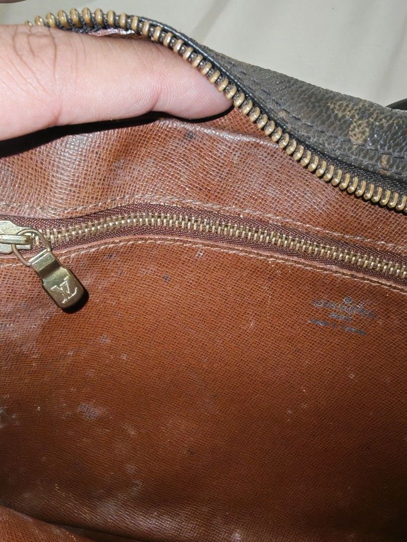 Louis Vuitton Monogram Canvas Shoulder Bag (Category: Luxury Bags & Wallets) located in Dipolog. Submitted by jamesestrada00 (Listing ID 1467224707, Image 3). Description: Classic Monogram canvas shoulder bag from Louis Vuitton. Made in France. Brown canvas body with tan leather trim, gold-tone hardware, and adjustable strap. Zip closure across the top with an inside zippered pocket. Interior lining shows some wear and fading around the brand sta