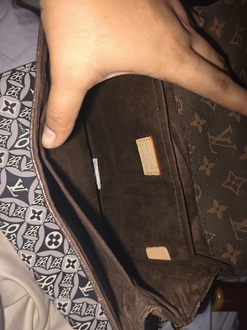 Louis Vuitton Monogram Messenger Crossbody Bag (Category: Luxury Bags & Wallets) located in Quezon City. Submitted by anitagalan89774 (Listing ID 1467177652, Image 3). Description: - Louis Vuitton monogram canvas crossbody bag - Elegant dark brown leather strap with adjustable buckle details - Secure gold-tone hardware front flap closure - Spacious interior with multiple compartments and fabric lining - Convenient exterior back zippered pocket - 
