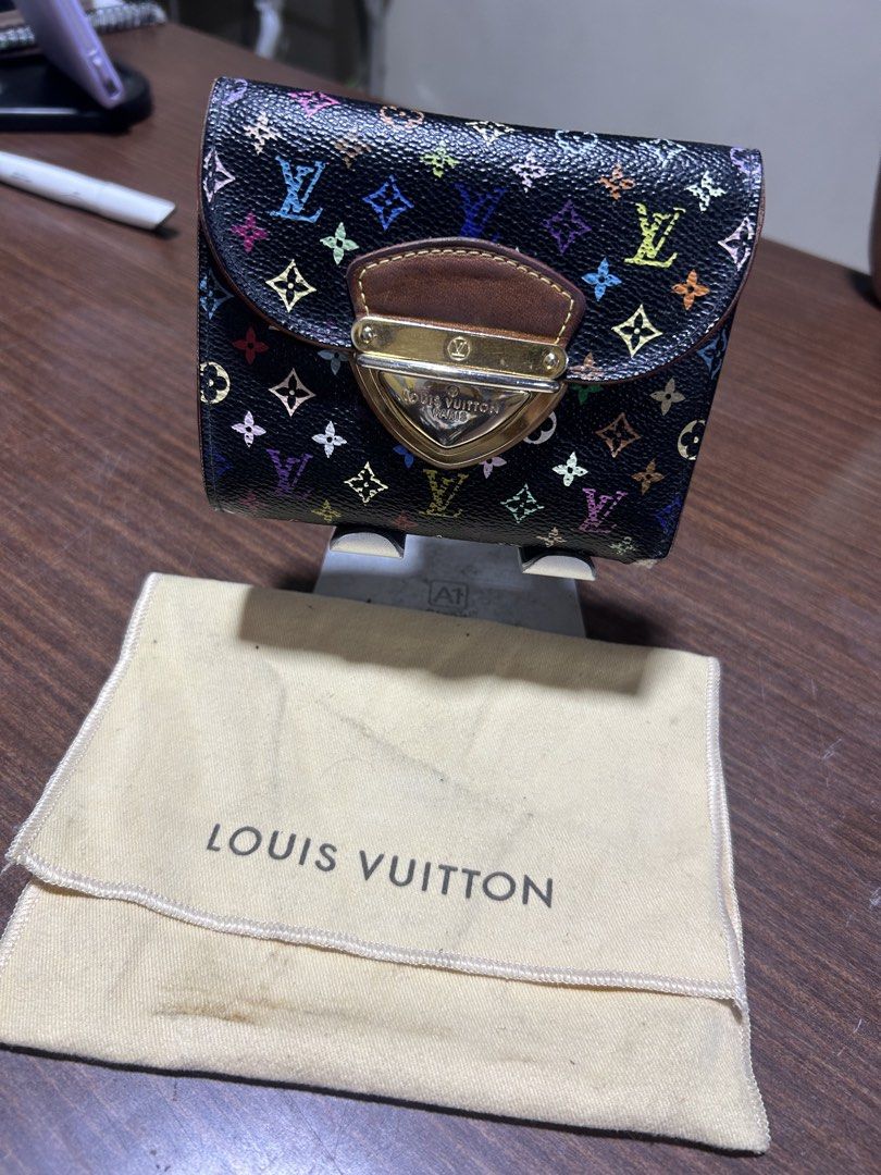 Louis Vuitton Monogram Multicolore Black Wallet (Category: Luxury Bags & Wallets) located in Manila. Submitted by starbalesukandjapansurplus (Listing ID 1467345023, Image 1). Description: - Authentic Louis Vuitton wallet - Iconic black Monogram Multicolore canvas - Vibrant pink leather interior lining - Secure gold-tone lock closure on the front flap - Includes original dust bag - Condition: As seen in photos.