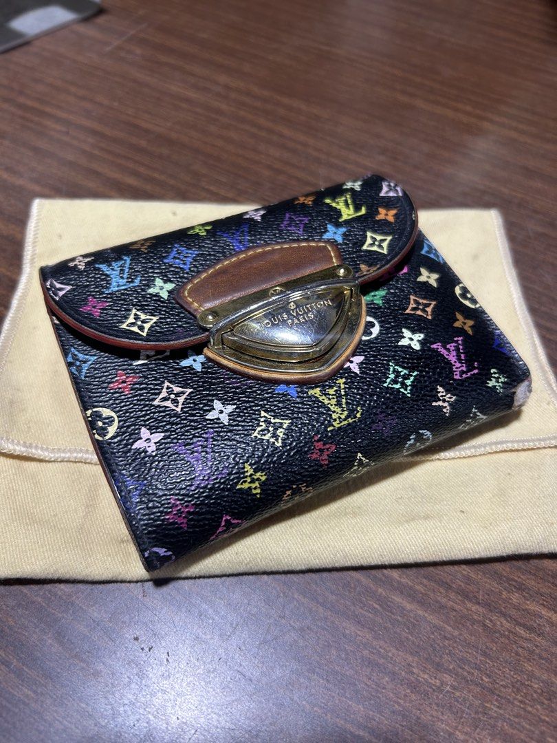 Louis Vuitton Monogram Multicolore Black Wallet (Category: Luxury Bags & Wallets) located in Manila. Submitted by starbalesukandjapansurplus (Listing ID 1467345023, Image 2). Description: - Authentic Louis Vuitton wallet - Iconic black Monogram Multicolore canvas - Vibrant pink leather interior lining - Secure gold-tone lock closure on the front flap - Includes original dust bag - Condition: As seen in photos.