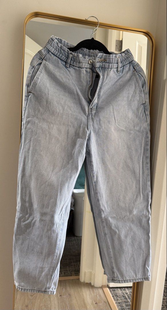 Love Bonito Mom Jeans (Category: Jeans) located in Taguig. Submitted by muntingkahon (Listing ID 1467222090, Image 1). Description: - Brand: Love Bonito - Size: Waist 28 inches - Wash: Light wash denim - Fit: Relaxed straight leg; Mom Jeans - Waistband: Elastic with cute ruffled top edge - Closure: Zip fly with button - Pockets: 2 front pockets, 2 back patch pockets - Condition: Great staple piece for casual everyday outfits!.