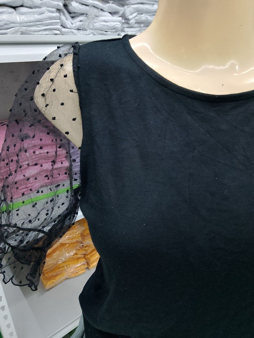 Lowrys Farm Black Blouse with Mesh Dot Sleeves Size M (Category: Blouses) located in Midsayap. Submitted by jarethshop (Listing ID 1467320842, Image 2). Description: - Brand: Lowrys Farm - Size: M (Tag attached) - Color: Solid black - Details: Sheer mesh sleeves with polka dot pattern, ruffled cuffs, and crew neckline - Condition: Brand new with tag - Style: Versatile for casual wear or dressing up.