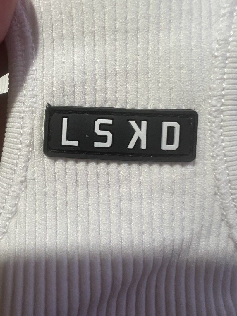 Lskd minimal seamless ribbed tank large (Category: Activewear) located in Iba. Submitted by xooperfindslb (Listing ID 1467345663, Image 3). Description: LSKD minimal seamless ribbed tabk top White Large on tag Can pass as new No issue Chest width when laid flat - 14”.