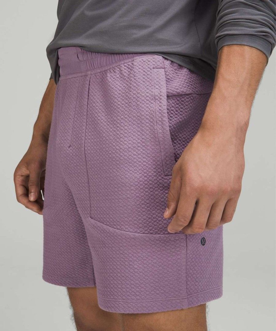 Lululemon 'At Ease Short 7' (Category: Shorts) located in Aroroy. Submitted by dr0p-a-dr1p (Listing ID 1467276673, Image 1). Description: Waist: 32-36 Length: 18 Hem: 13 - Brand: Lululemon - Color: Purple Ash - Material: Unique waffle-like textured fabric - Waistband: Elastic with adjustable drawstring - Pockets: Convenient side hand pockets - Details: Iconic Lululemon logo near the hem - Condition: Great overall condition.