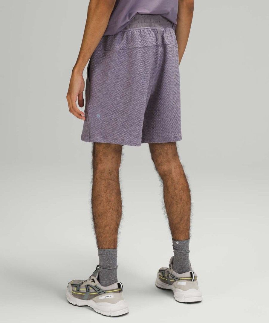 Lululemon 'At Ease Short 7' (Category: Shorts) located in Aroroy. Submitted by dr0p-a-dr1p (Listing ID 1467276673, Image 3). Description: Waist: 32-36 Length: 18 Hem: 13 - Brand: Lululemon - Color: Purple Ash - Material: Unique waffle-like textured fabric - Waistband: Elastic with adjustable drawstring - Pockets: Convenient side hand pockets - Details: Iconic Lululemon logo near the hem - Condition: Great overall condition.
