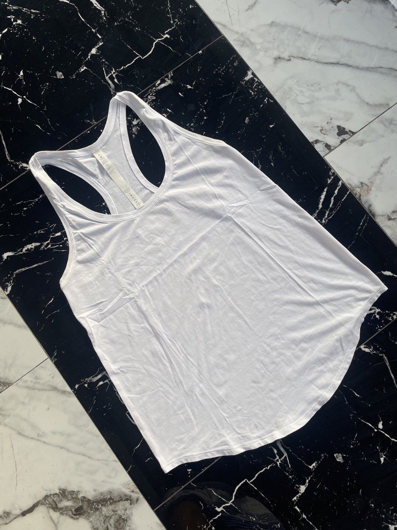 Lululemon Athletic White Racerback Tank Top Size 6 (Category: Activewear) located in Catigbian. Submitted by ekong_yeager (Listing ID 1467267704, Image 2). Description: Lululemon Love Tank Top Price: 450+shipping fee Excellent condition Authentic As new Color rate 9.8/10 No issue Washed and ready to wear measurements: - 16 width - 24 length unli vouch and vc with item Bohol, Visayas📍 📩.