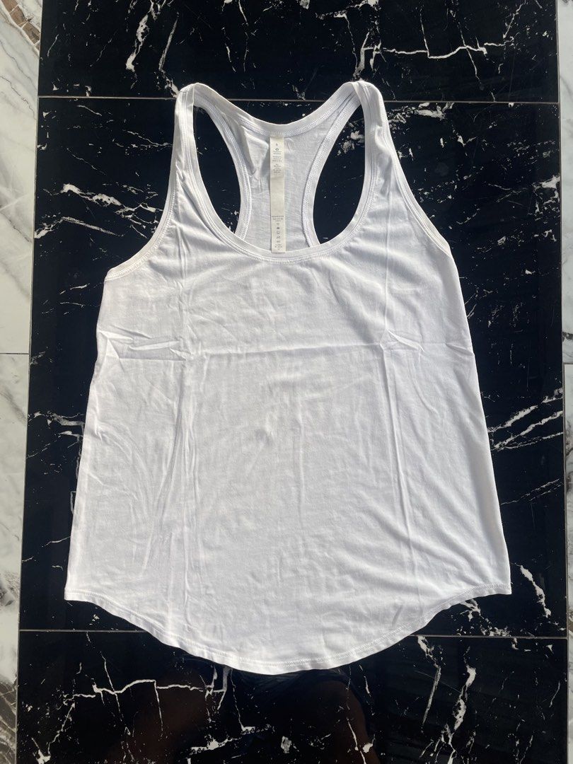 Lululemon Athletic White Racerback Tank Top Size 6 (Category: Activewear) located in Catigbian. Submitted by ekong_yeager (Listing ID 1467267704, Image 1). Description: Lululemon Love Tank Top Price: 450+shipping fee Excellent condition Authentic As new Color rate 9.8/10 No issue Washed and ready to wear measurements: - 16 width - 24 length unli vouch and vc with item Bohol, Visayas📍 📩.