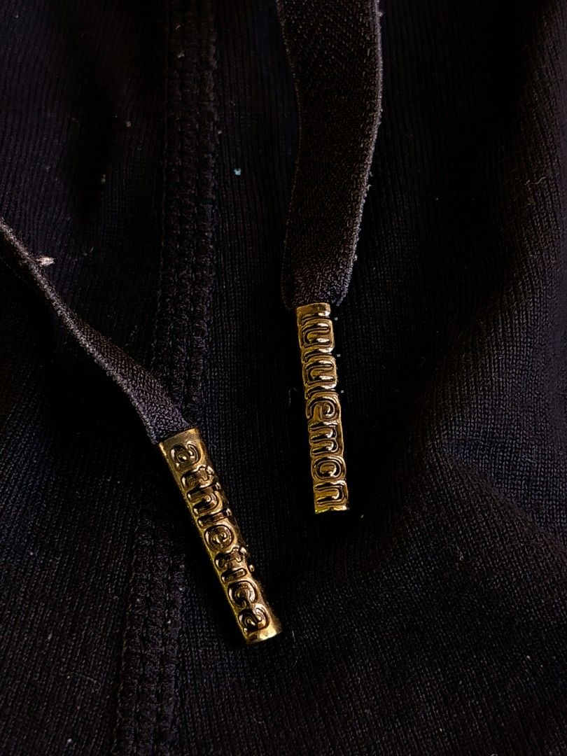Lululemon Black Athletic Shorts Size 4 (Category: Shorts) located in Manila. Submitted by virgiliosa38485 (Listing ID 1467292412, Image 3). Description: - Brand: Lululemon - Size: 4 (Color: Black) - Waistband: Frilly elastic with drawstring and gold-toned metal aglets - Features: Dual front pockets, curved hem, and reflective back logo - Material: Soft, comfortable cotton-blend fabric - Condition: Excellent, great for workouts or lounging.