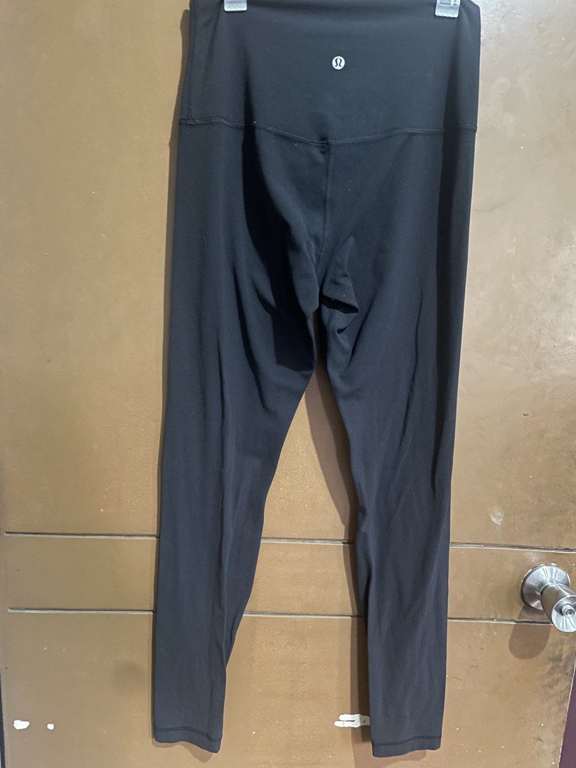 Lululemon Black Leggings Size 8 (Category: Activewear) located in Manila. Submitted by mochi_dear (Listing ID 1467202609, Image 2). Description: - Brand: Lululemon - Size: 8 - Color: Classic solid black (easy to match with any outfit) - Rise: High-rise waistband for extra support and comfort - Material: 81% nylon, 19% lycra elastane - Condition: Wash care label intact inside - Ideal for: Gym workouts, running, or casual daily wear.