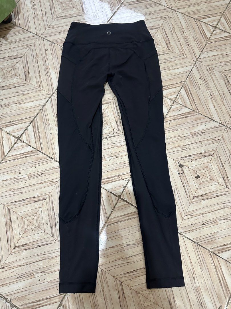 Lululemon Black Leggings Size 6 (Category: Activewear) located in Angeles City. Submitted by alejeong27 (Listing ID 1467267825, Image 2). Description: - Brand: Lululemon - Color: Classic Black - Size: 6 (tag attached) - Features: Structured contour seams for a flattering fit, comfortable waistband, and signature silver reflective omega logo on the back hip - Fabric: Soft, high-stretch athletic material for maximum comfort - Condition: Excellent p