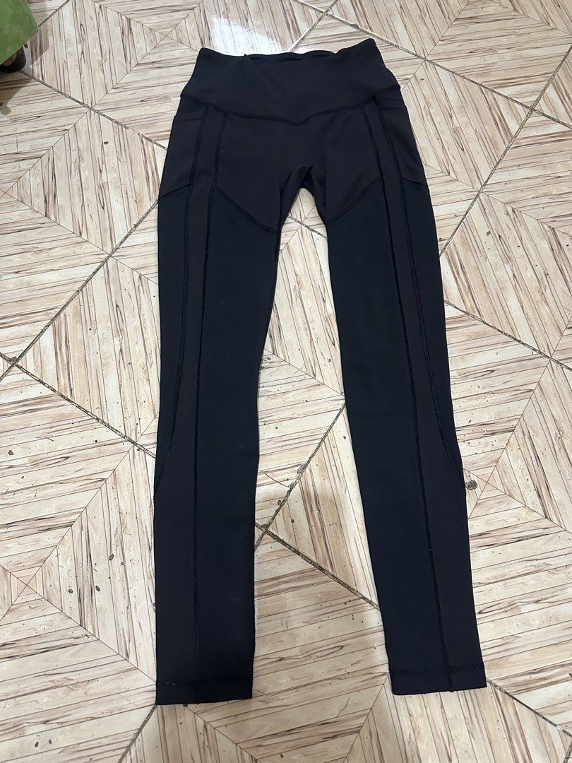 Lululemon Black Leggings Size 6 (Category: Activewear) located in Angeles City. Submitted by alejeong27 (Listing ID 1467267825, Image 1). Description: - Brand: Lululemon - Color: Classic Black - Size: 6 (tag attached) - Features: Structured contour seams for a flattering fit, comfortable waistband, and signature silver reflective omega logo on the back hip - Fabric: Soft, high-stretch athletic material for maximum comfort - Condition: Excellent p