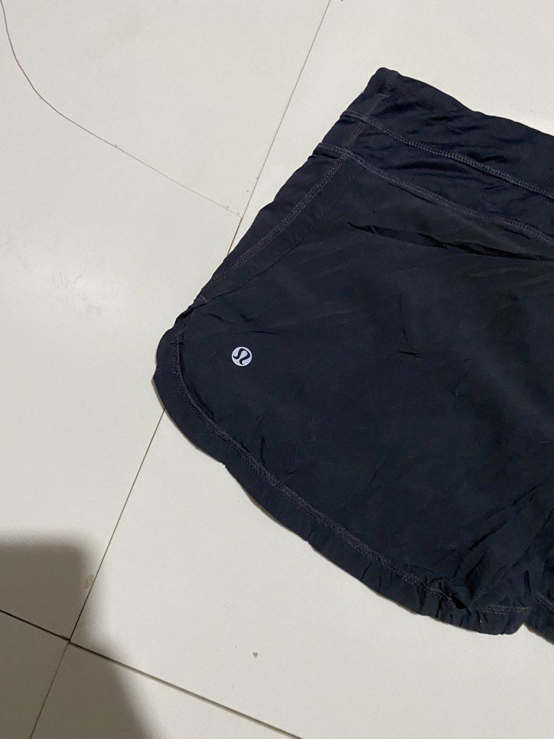 Lululemon Speed Up Shorts Black Size 6 (Category: Shorts) located in Antipolo. Submitted by cogiestamaria (Listing ID 1467196008, Image 3). Description: - Brand: Lululemon - Style: Running shorts with built-in liner - Size: 6 - Color: Classic Black - Features: Secure back waistband pocket with branded zipper pull, signature white omega logo on lower left leg - Material: Lightweight, breathable athletic fabric - Condition: Excellent, clean, no tea