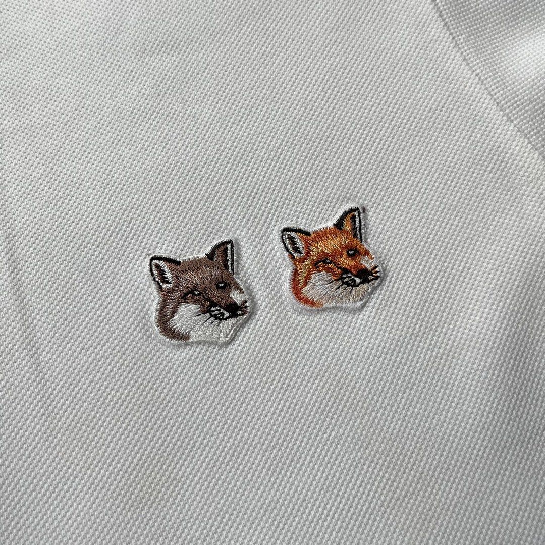 Maison Kitsune Double Fox Head Polo Shirt (Category: Tshirts & Polo Shirts ) located in Panabo. Submitted by curated.dept (Listing ID 1467275877, Image 3). Description: size medium 20.5 width, 29 length excellent condition 9/10 color rate very unnoticeable washable stain no major flaws.