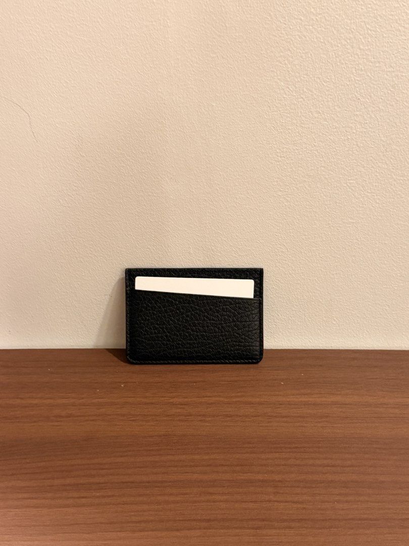 Maison Margiela Black Leather Card Case Holder (Category: Luxury Bags & Wallets) located in Taguig. Submitted by sourcedbym (Listing ID 1467300377, Image 1). Description: Brand new. Comes complete with cards, box.