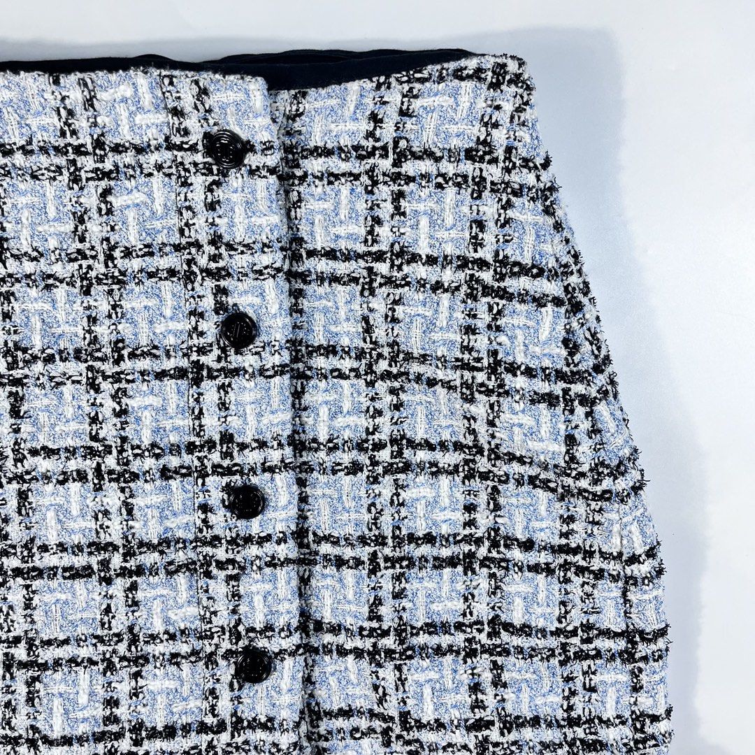 Maje Jizuli Checked Tweed Mini Skirt (Category: Activewear) located in Iloilo. Submitted by profitpicks (Listing ID 1467354124, Image 2). Description: Measurement: W’ 26 | L’ 14 Maje Jizuli Checked Tweed Mini Skirt (also referred to as a tweed mini skort), featuring a blue and black check pattern, offset front buttons, and a bottom velvet or braided trim..
