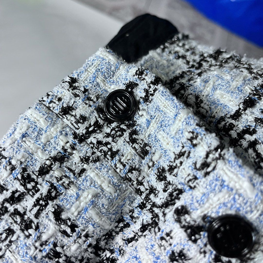 Maje Jizuli Checked Tweed Mini Skirt (Category: Activewear) located in Iloilo. Submitted by profitpicks (Listing ID 1467354124, Image 3). Description: Measurement: W’ 26 | L’ 14 Maje Jizuli Checked Tweed Mini Skirt (also referred to as a tweed mini skort), featuring a blue and black check pattern, offset front buttons, and a bottom velvet or braided trim..
