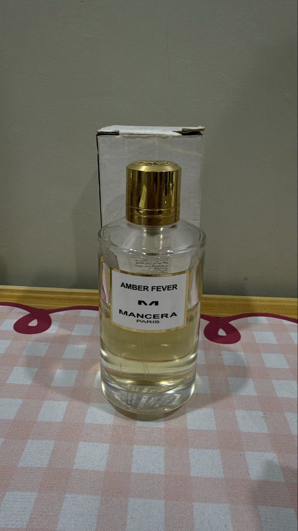 Mancera Amber Fever EDP (Category: Fragrance & Deodorants) located in Quezon City. Submitted by rdecants (Listing ID 1467328198, Image 1). Description: Authentic Mancera Amber Fever Eau de Parfum - Bottle size: Approx. 120ml with gold cap and label - Fragrance profile: Rich amber scent with heavy projection and great longevity - Storage: Kept in a cool, dark place away from sunlight to maintain quality - Condition: Full bottle, well-maintained.