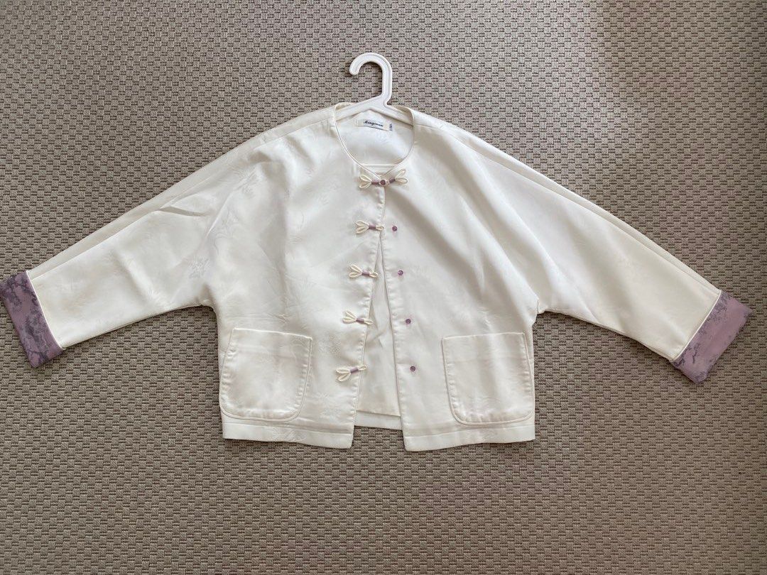 Mandarin / Chinese Collar Jacket (Category: Coats, Jackets and Outerwear) located in Pasig City. Submitted by misscsj (Listing ID 1467189837, Image 3). Description: - Brand/Style: Mingxuan silk blouse - Color: Off-white with floral jacquard pattern - Details: Traditional front frog closures with purple accents and matching purple sleeve cuffs - Features: Two convenient front patch pockets - Size: S (tag at collar) - Occasion: Great for cultural e