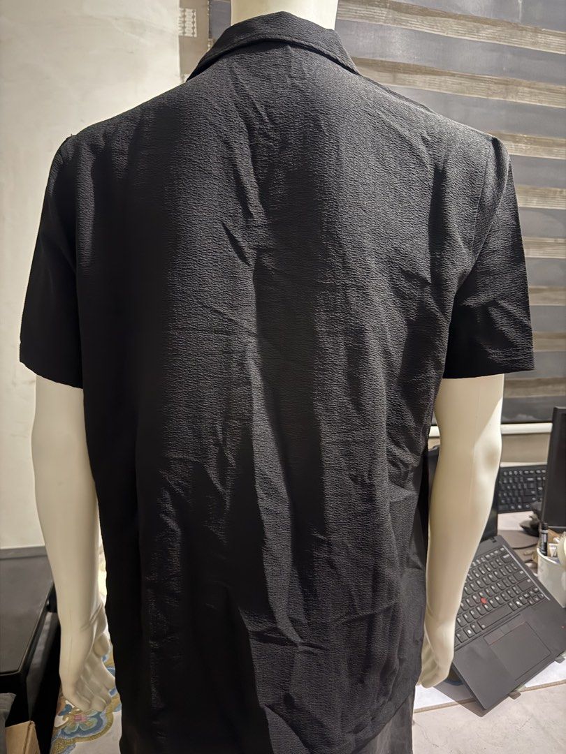 MANFINITY Plain Black Button Down Polo (Category: Tshirts & Polo Shirts ) located in Las Pinas. Submitted by sellerkjb (Listing ID 1467356410, Image 3). Description: BRAND NEW Medium on tag 22 x 22 inches Las Pinas.