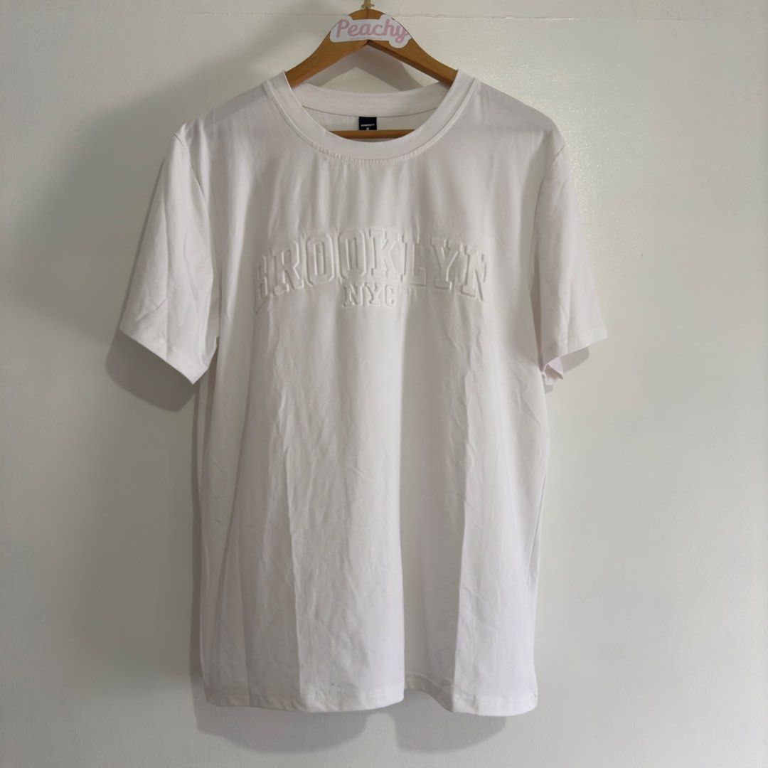 Manfinity t shirt (Category: Tshirts & Polo Shirts ) located in Manila. Submitted by apparella.ph (Listing ID 1467285772, Image 1). Description: Nastock lng sa closet Bnwot Wash nlng bago use nadumihan kasi nastock but removable sya Super comfy or lambot nya Malamig sya sa katawan Bust:42 Length:28.