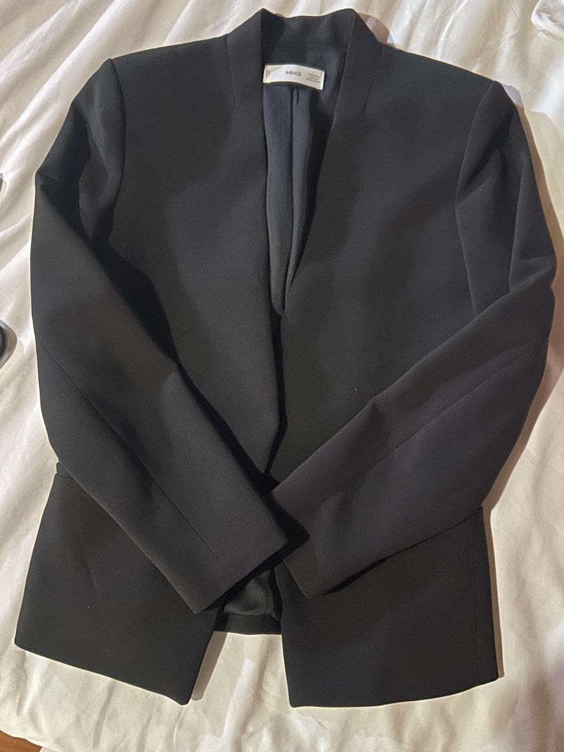 Mango Black Blazer Size S (Category: Coats, Jackets and Outerwear) located in Cebu City. Submitted by shopmikascloset (Listing ID 1467293919, Image 3). Description: Worn twice only, still in like new condition - Size: EUR-USA S - Color: Classic Solid Black - Design: Collarless, open front, clean structured look - Lining: Smooth interior lining - Style: Versatile for work, meetings, or smart casual outfits.