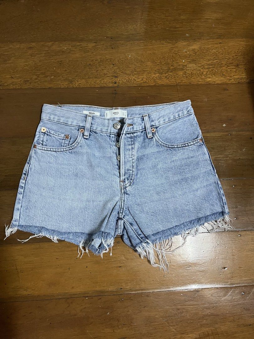 Mango Denim Hailey Shorts Size EUR 36 USA 4 (Category: Shorts) located in Mandaluyong City. Submitted by dadsmiddlechild (Listing ID 1467353421, Image 1). Description: - Brand: Mango - Model: Hailey - Color: Light blue wash - Size: EUR 36 / USA 4 / MEX 3 - Closure: Button fly - Details: Raw frayed hem, classic five-pocket styling - Origin: Made in Pakistan.