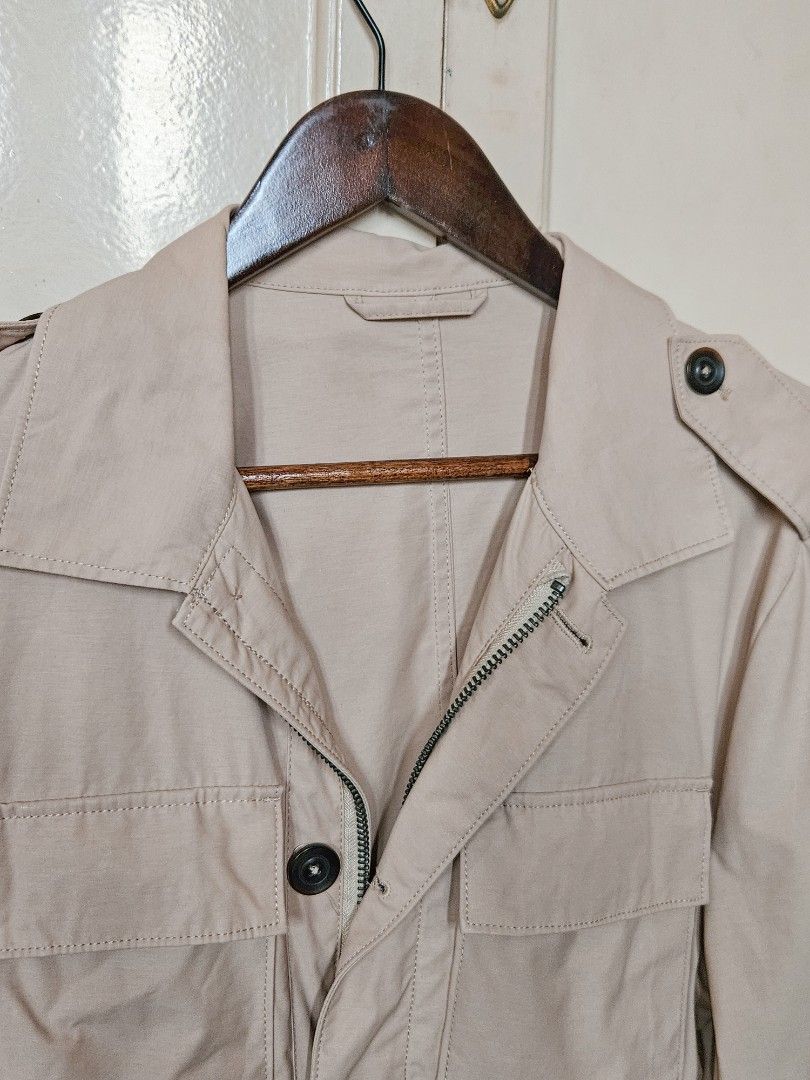 Mango Man Beige Water Repellant Jacket/Coat (Category: Coats, Jackets and Outerwear) located in Manila. Submitted by trisdays (Listing ID 1467339949, Image 2). Description: - trench coat-like water repelleant jacket/outerwear perfect for the rainy season - front has buttons as well as zipper - multiple pockets - used but not abused 🩷 - price is a but negotiable.