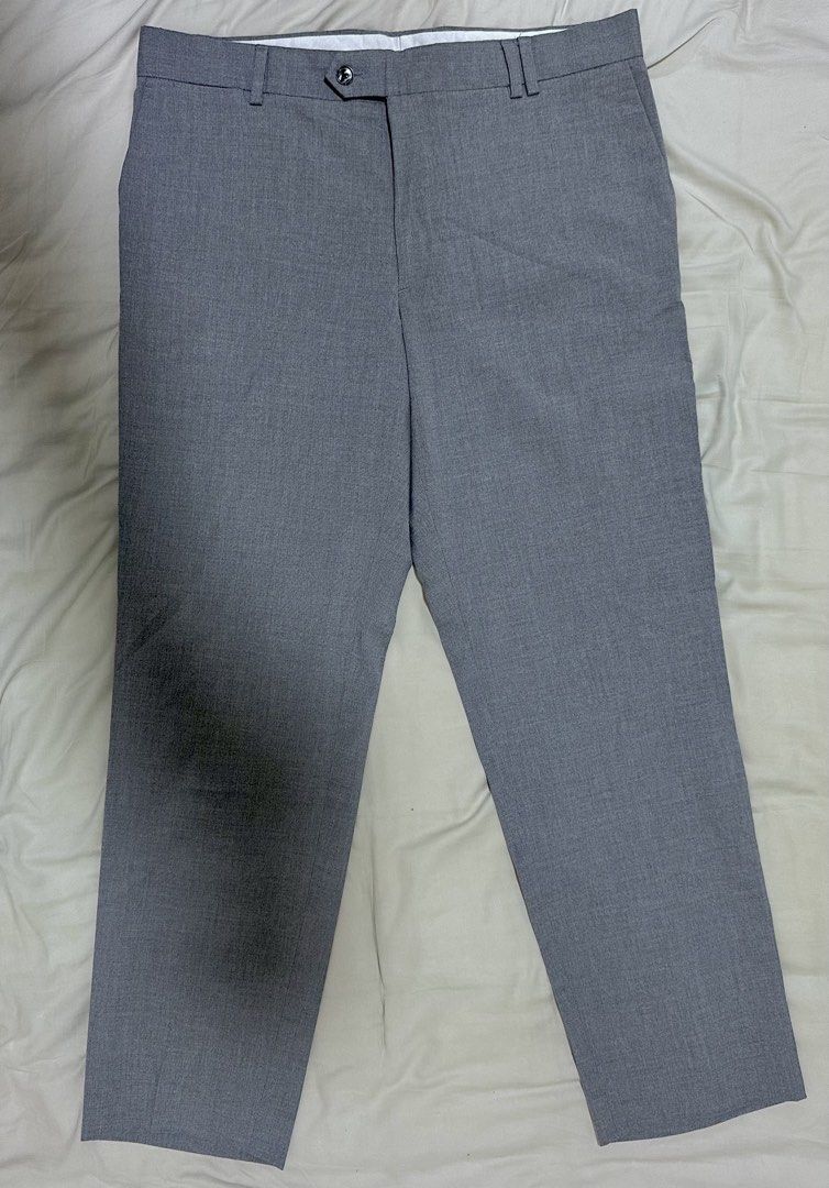 Mango Man Tailored Grey Trousers Size 34 (Category: Trousers) located in Quezon City. Submitted by aussomefinds (Listing ID 1467203969, Image 1). Description: - Brand: Mango Man Tailored - Size: EUR 44 / IT 48 / US/UK/MEX 34 - Color: Classic Grey - Fit: Standard straight leg cut with a clean waistline and belt loops - Closure: Single button - Fabric: Smooth, lightweight, and comfortable - Condition: Excellent, ready for a new owner - Perfect for: