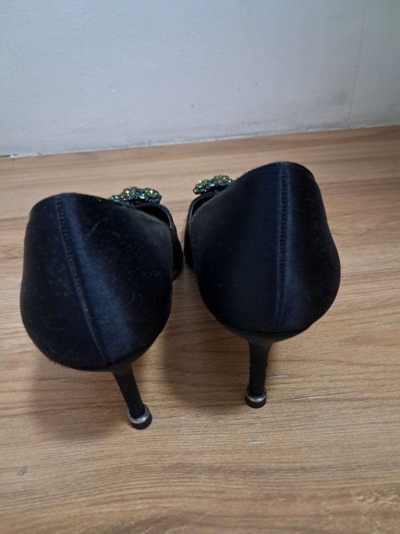 Manolo Blahnik (Category: Sneakers & Footwear) located in Muntinlupa City. Submitted by msshoppingera (Listing ID 1467225776, Image 3). Description: Manolo Blahnik pointed toe heels with thin stiletto heel black satin upper with green crystal toe embellishments. Size 39 Payment first before shipping. Shipping fees will be shouldered by the buyer. No return No exchange .