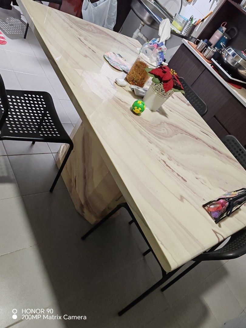 Marble pattern dining table with solid central base (Category: Tables & Sets) located in Singapore. Submitted by uesm31 (Listing ID 1467319886, Image 3). Description: - Rectangular dining table with a chic pink and white marble-look top - Sturdy solid central support block matching the tabletop design - Smooth, glossy finish that is easy to wipe clean after meals - Spacious surface that fits multiple chairs comfortably - Neutral tones designed to