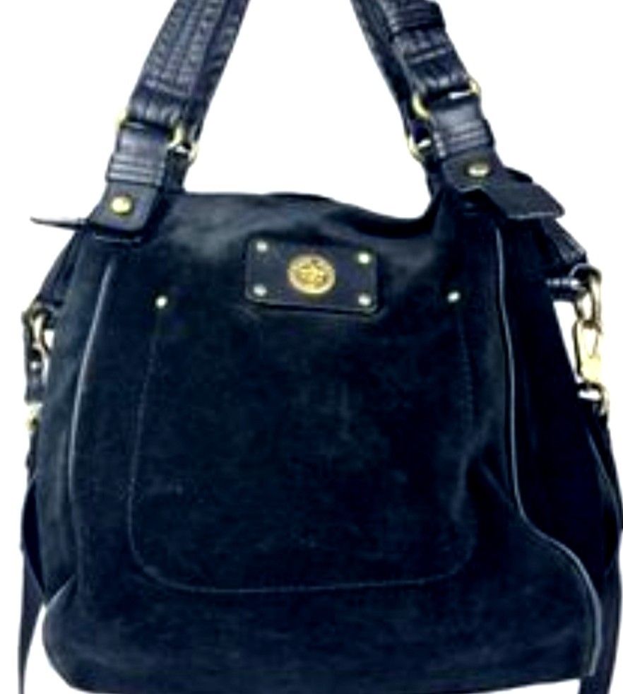 Marc by Marc Jacobs Black Suede Handbag (Category: Cross-body Bags) located in Manila. Submitted by lene48 (Listing ID 1467278967, Image 2). Description: - Brand: Marc by Marc Jacobs - Material: Premium black suede with gold-tone hardware - Closure: Secure turnlock plate on the front exterior pocket - Carrying Options: Dual top handles and a detachable shoulder strap - Interior: Stylish black and white patterned fabric lining with a convenient zi