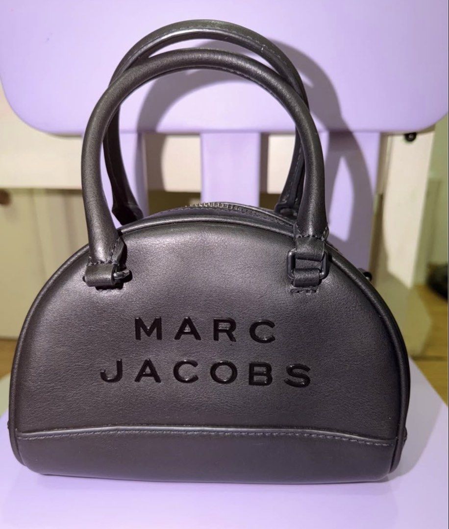 Marc Jacobs Bowling Bag (Category: Luxury Bags & Wallets) located in Manila. Submitted by 08sophia (Listing ID 1467232321, Image 1). Description: Marc Jacobs Bowling Bag. Black. No flaws. 100% good as new. 100% authentic. Bought in Marc Jacobs Outlet store in SFO. Kasya promax..