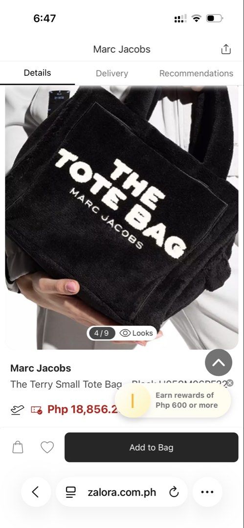 Marc Jacobs The Terry Small Tote Bag Black (Category: Tote Bags) located in Manila. Submitted by nicolesant58999 (Listing ID 1467168762, Image 1). Description: - Brand: Marc Jacobs Small Tote Bag - Material: Soft black terry cloth fabric with plush texture - Design: White embroidered text on front and branded leather patch on back - Strap: Includes adjustable black crossbody strap - Closure & Storage: Secure zip-top closure with convenient interi